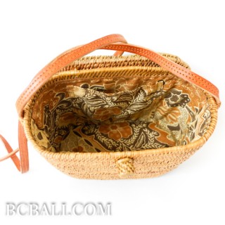 ladies handbag made from ata grass straw leather long  strap bali indonesia